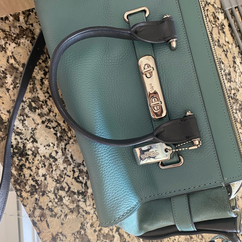 Teal coach purse